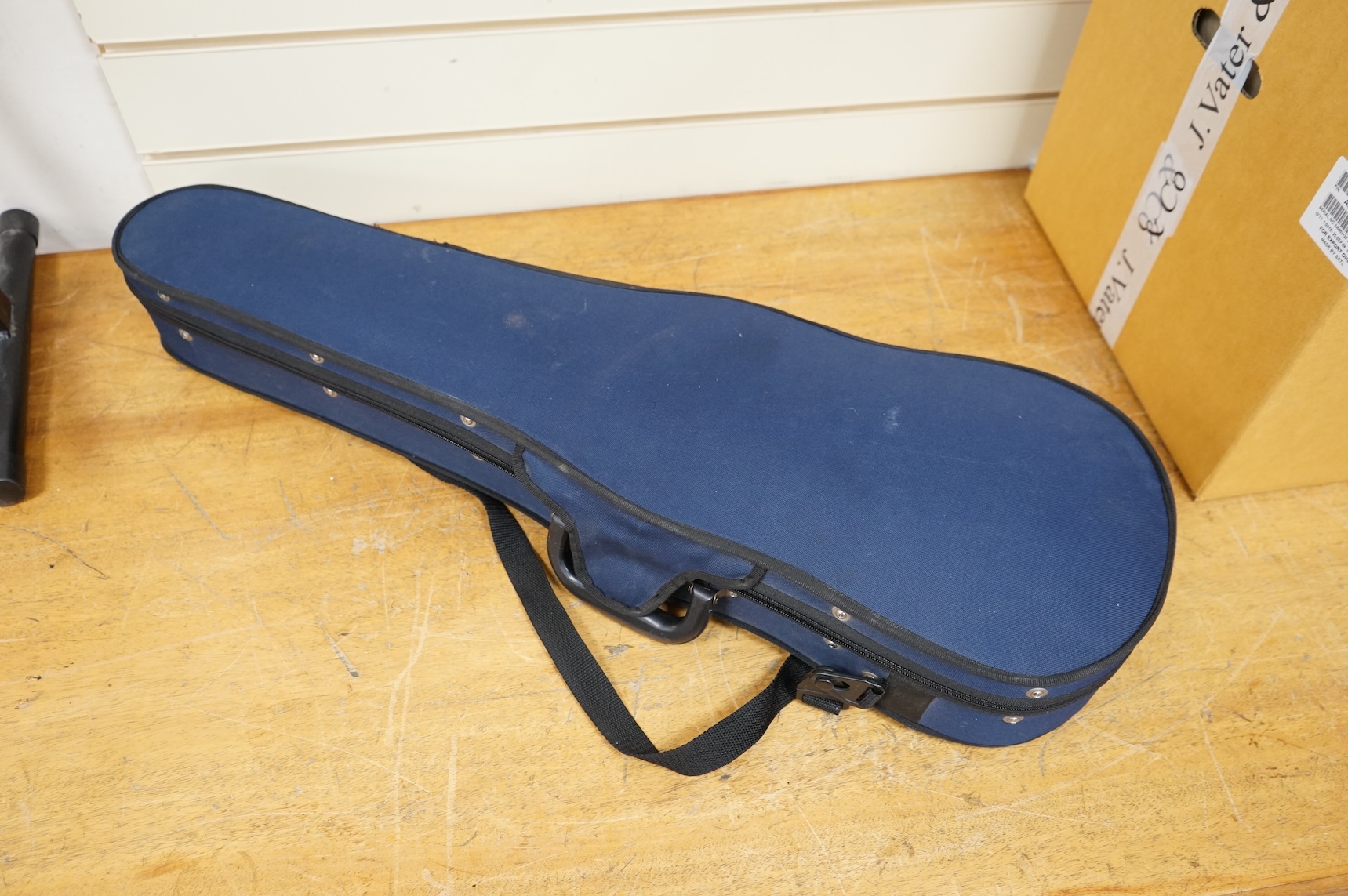 A cased late 19th century violin, signed ‘Nicolas Bertolini’, back 36.3cm, with bow stamped Paesold, CITES Submission reference, D9GSYMLJ